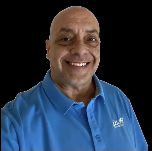 Jay Hembree of DJ Jay Entertainment wearing a blue DJ Jay polo shirt