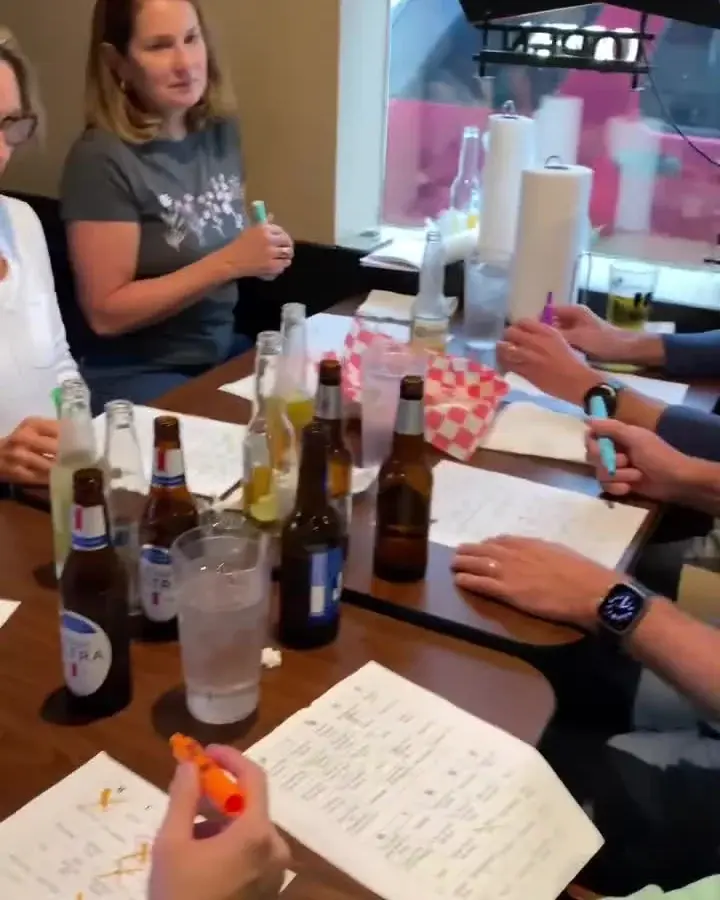Guests playing Jay's original Hit-List Bingo at a local venue