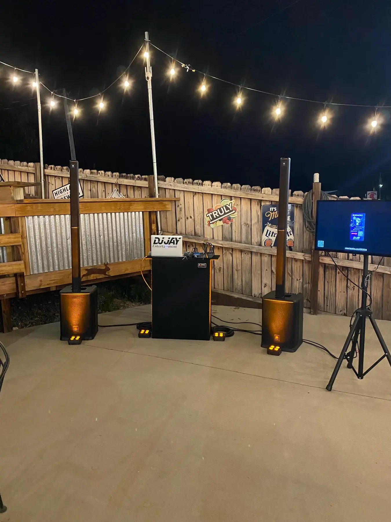 DJ Jay karaoke sound and lighting setup prepared for a venue night